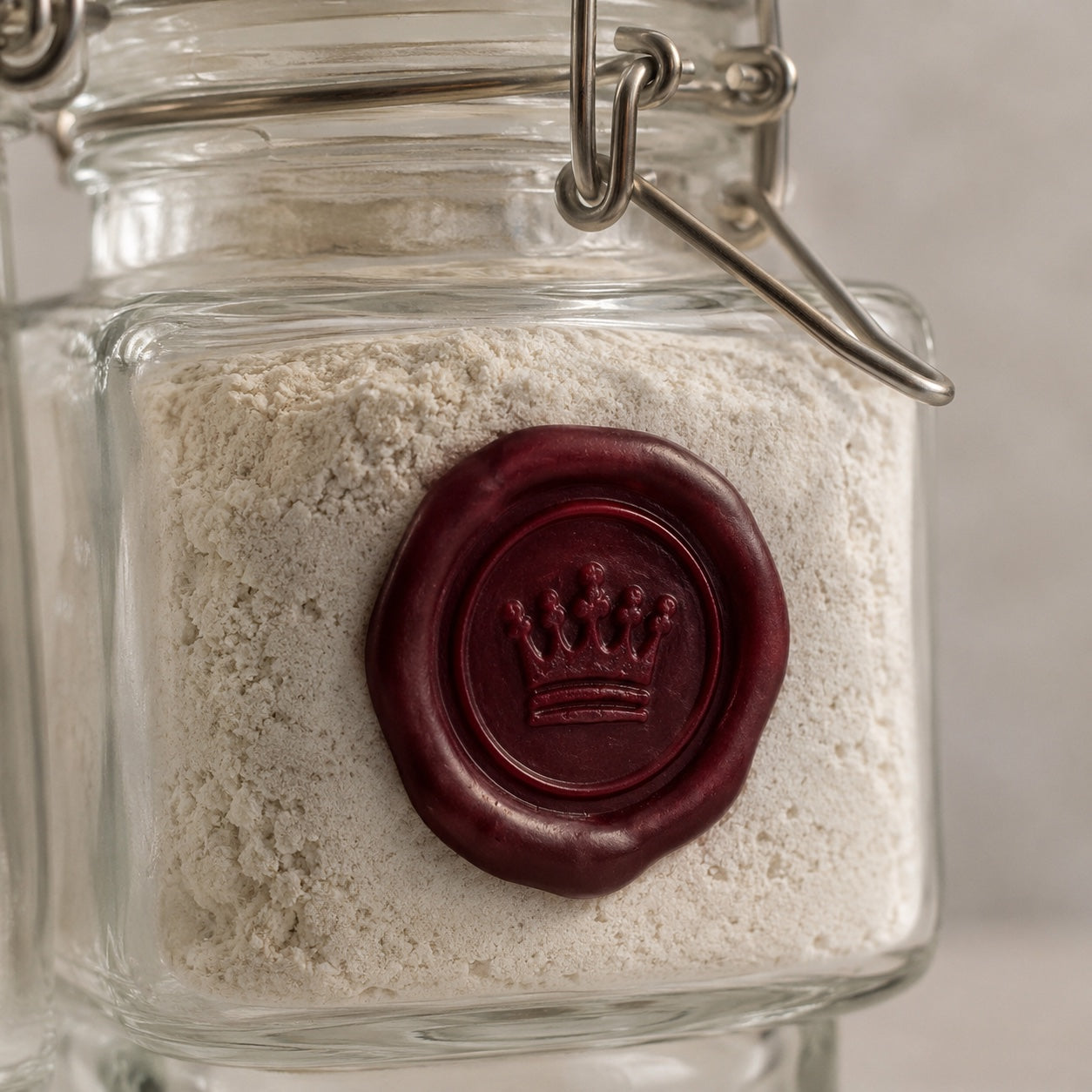 Crown Tooth Powder jar with a burgundy wax crown seal
