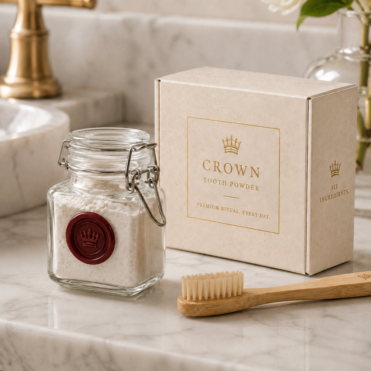 Crown Tooth Powder box and glass jar of powder on a light marble bathroom counter