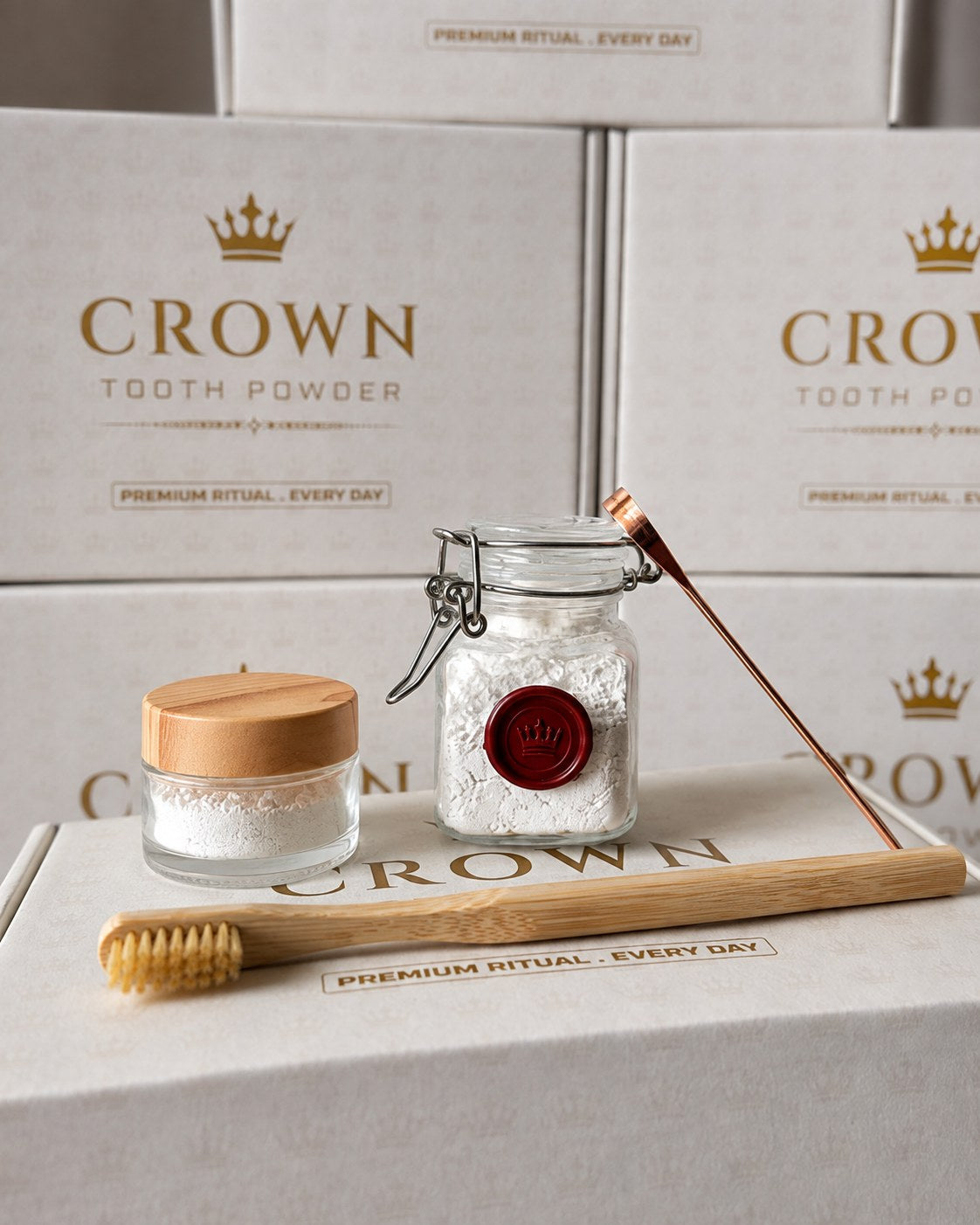 Crown tooth powder jar with red wax crown seal beside the travel jar, bamboo brush, and copper tongue scraper.